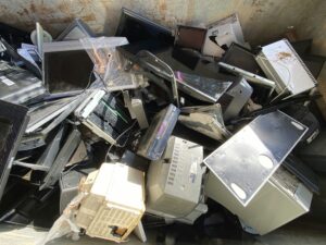 A Pile Of Junk Electronics To Be Hauled Away And Recycled