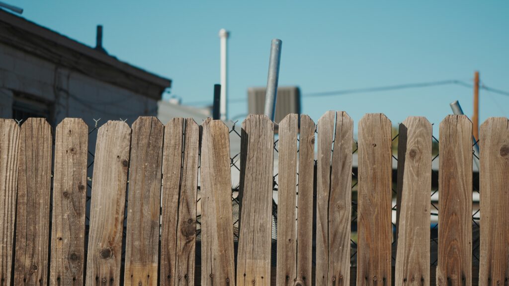 Old Paneled Privacy Fence To Be Tore Down And Hauled Off