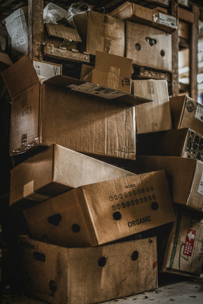 Junk Cardboard In A Lose Stack Waiting To Be Picked Up and Recycled